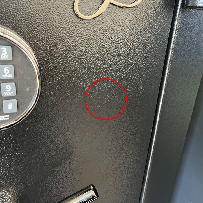 Close up of scratch on USED TF5924E5 GUN SAFE BY AMSEC